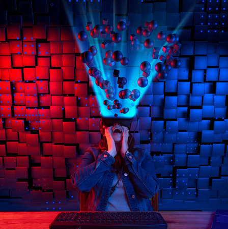 Hispanic woman sitting at her desk entertained in the 3D cyberspace of spheres and cubes with her...