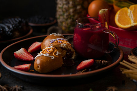 Guagua de pan with cup of colada morada, traditional Ecuadorian food for the day of the dead,...