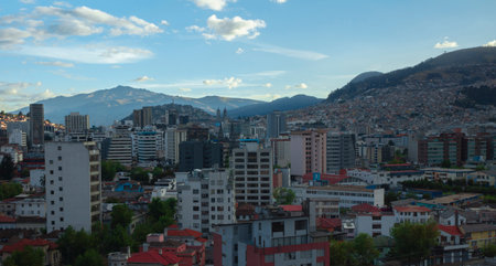 Panoramic view of the northern part of Quito in the afternoon with the sun setting until the sky darkens - Ecuadorの写真素材