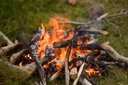 Photo shows how the fire is burning, tongues of flame of orange thread are bursting out of the...