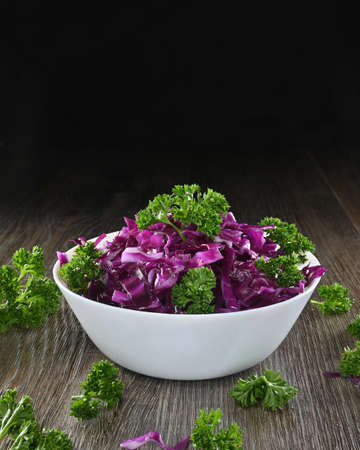 A light red cabbage salad with olive oil is great for the whole family. Close-up photo with salad for details of ingredients.の写真素材
