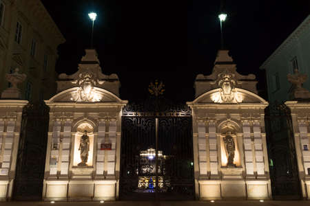 Warsaw, Poland - January 25, 2015: Warsaw University gates at night with illumination in Warsaw,...
