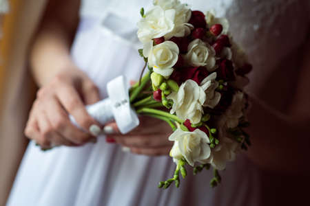 Wedding Bridal bouquet in the handsの写真素材