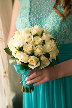 Wedding Bridal bouquet in the handsの写真素材
