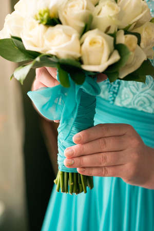 Wedding Bridal bouquet in the handsの写真素材