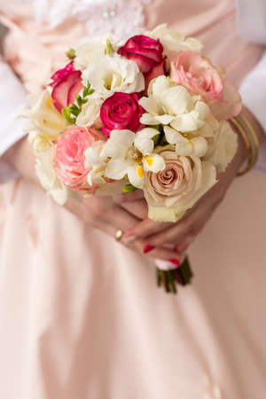 Wedding Bridal bouquet in the handsの写真素材