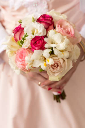 Wedding Bridal bouquet in the handsの写真素材