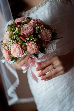 Wedding Bridal bouquet in the handsの写真素材