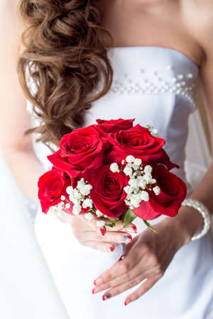 Wedding Bridal bouquet in the handsの写真素材
