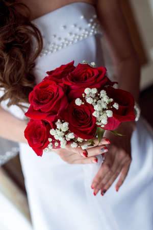 Wedding Bridal bouquet in the handsの写真素材