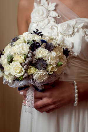 Wedding Bridal bouquet in the handsの写真素材