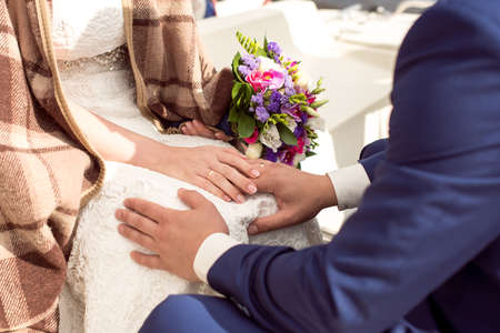 Wedding Bridal bouquet in the handsの写真素材