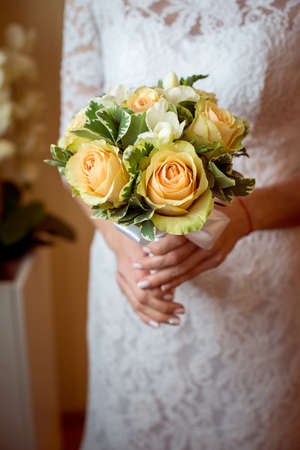 Wedding Bridal bouquet in the handsの写真素材