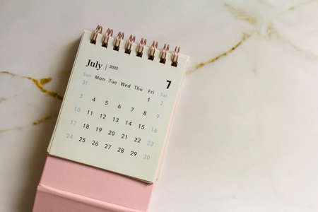 Desktop calendar for June 2022 on a light backgroundの写真素材