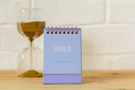 Desktop calendar for the new year 2023 on a light backgroundの写真素材