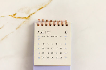 Desktop calendar for April 2023 on a light abstract backgroundの写真素材