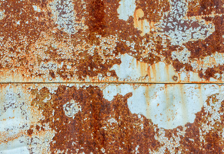 Light blue corroded metal background. Rusty and scratched painted metal wall. Rusty metal background...
