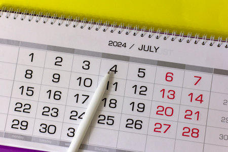 July 2024 desk calendar on your desktop for planningの写真素材