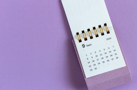 Monthly desk calendar for September 2024 on your desktop. Copy space