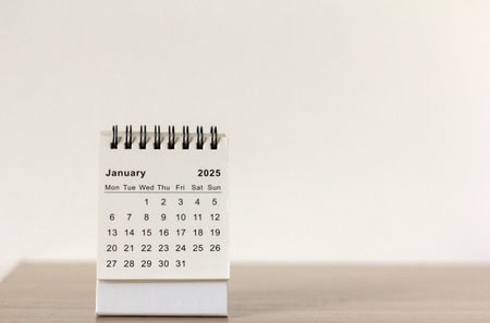 Hello, 2025. The planning calendar for January 2025 is on the tableの写真素材