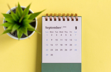 Calendar for September 2024 on a yellow background