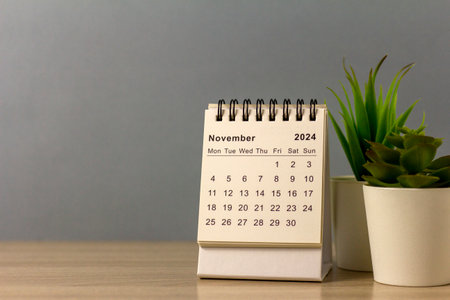 Desk calendar for November 2024 on a gray background with space for copyingの写真素材