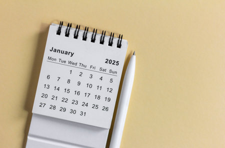 Hello 2025. Calendar for planning on beige backgroundの写真素材