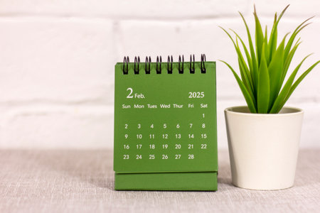 Desk calendar for February 2025. Calendar for planning and managing each dateの写真素材