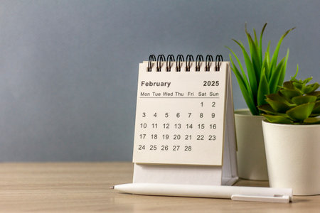 Hello, February 2025. Desk calendar for planning and organizing timeの写真素材