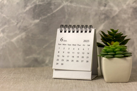 Hello June. The planning calendar for June 2025 is on the desktop