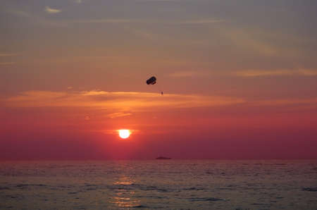 Paragliding during sunset, Thailandの写真素材