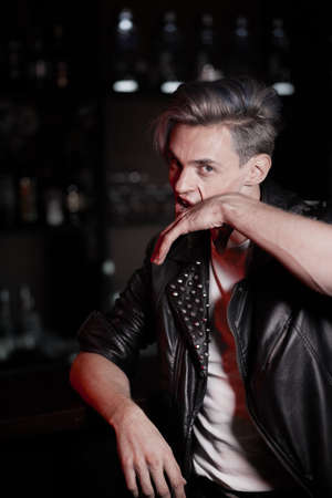 Man wiping blood off his faceの写真素材