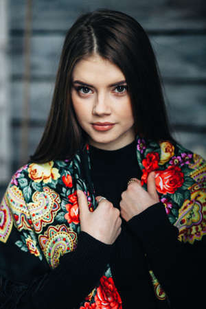 Beautiful young woman wearing scarfの写真素材