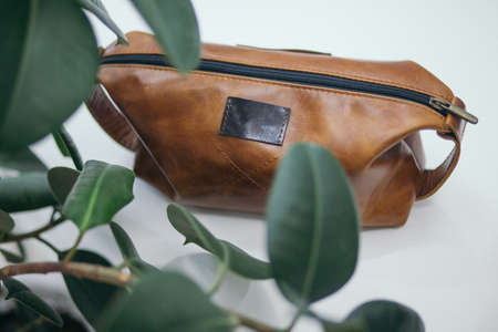 Brown cosmetic bag on white background. Naturalの写真素材