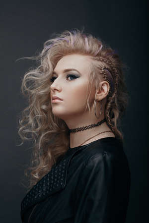 Young beautiful stylish blond woman in choker