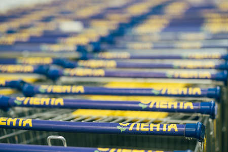 Shopping trolleys of the hypermarket Lenta. Supermarket in Russiaのeditorial素材