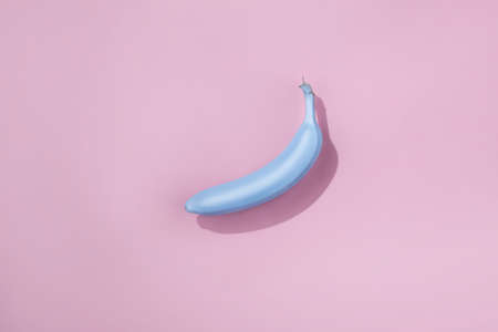 Top view of blue banana on pink backgroundの写真素材