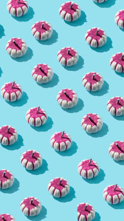 Autumn sunlit colorful pattern with pumpkins. Flat lay Thanksgiving or Halloween concept.の写真素材