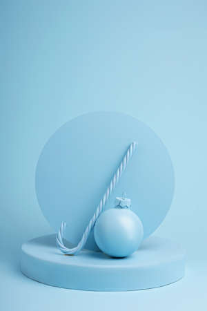 Creative winter layout made of bauble ornaments. Christmas or New Year season concept. Concept scene stage podium showcase, for product, promotion, sale, banner, presentation, cosmetic. Flat lay.の写真素材