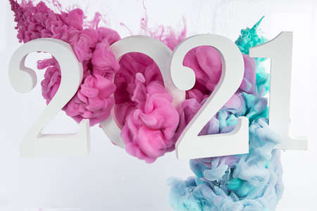 Happy New Year 2021. Greeting card with colorful vibrant clouds. Beautiful holiday web banner with copy space for text. Christmas festive concept.の写真素材