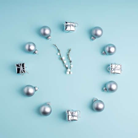 Countdown to midnight. Arranged clock counting last moments before Christmas or New Year on pastel...