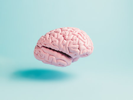 Pink human brain floating and flying over pastel blue background. Creative thinking concept. Medical...