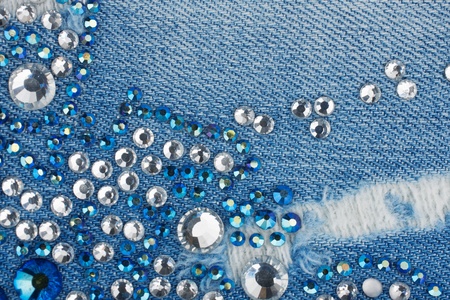 Light-blue denim with blue and silver rhinestones, backgroundの写真素材