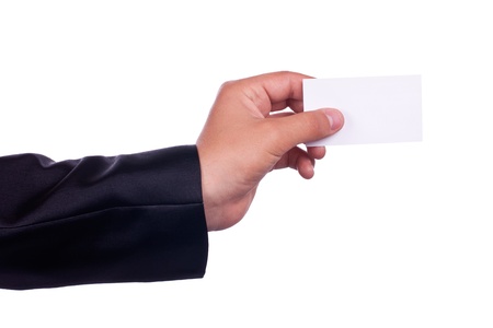 Paper card in hand, isolated on white background の写真素材