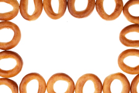 The frame of the small bagels, isolated on white
