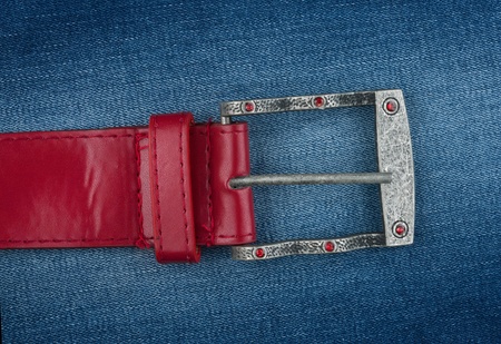 Red strap is on denim,backgroundの写真素材