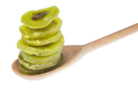 Kiwi in a wooden spoon, isolated on a white backgroundの写真素材
