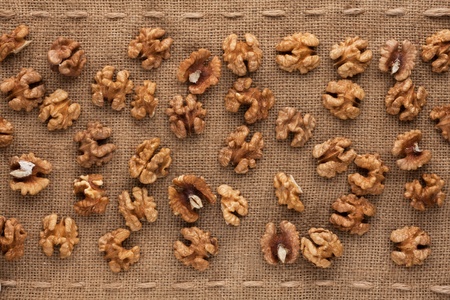 Peeled walnut lying on sackcloth の写真素材