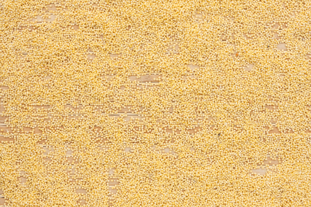 Background of millet  lying on a bamboo mat, how the textureの写真素材