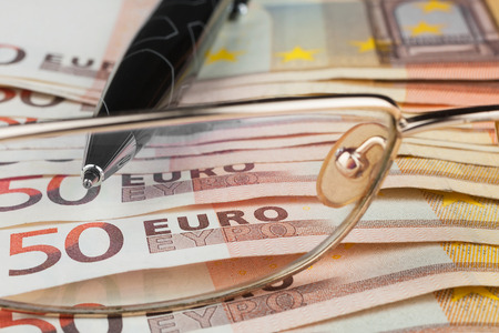 
The handle and glasses  is on the euro, can be used as backgroundの写真素材